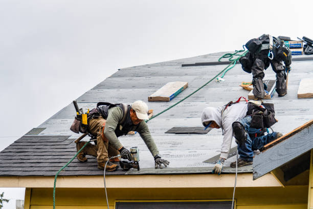 Professional Gutter Installation technician working in Cressey, CA